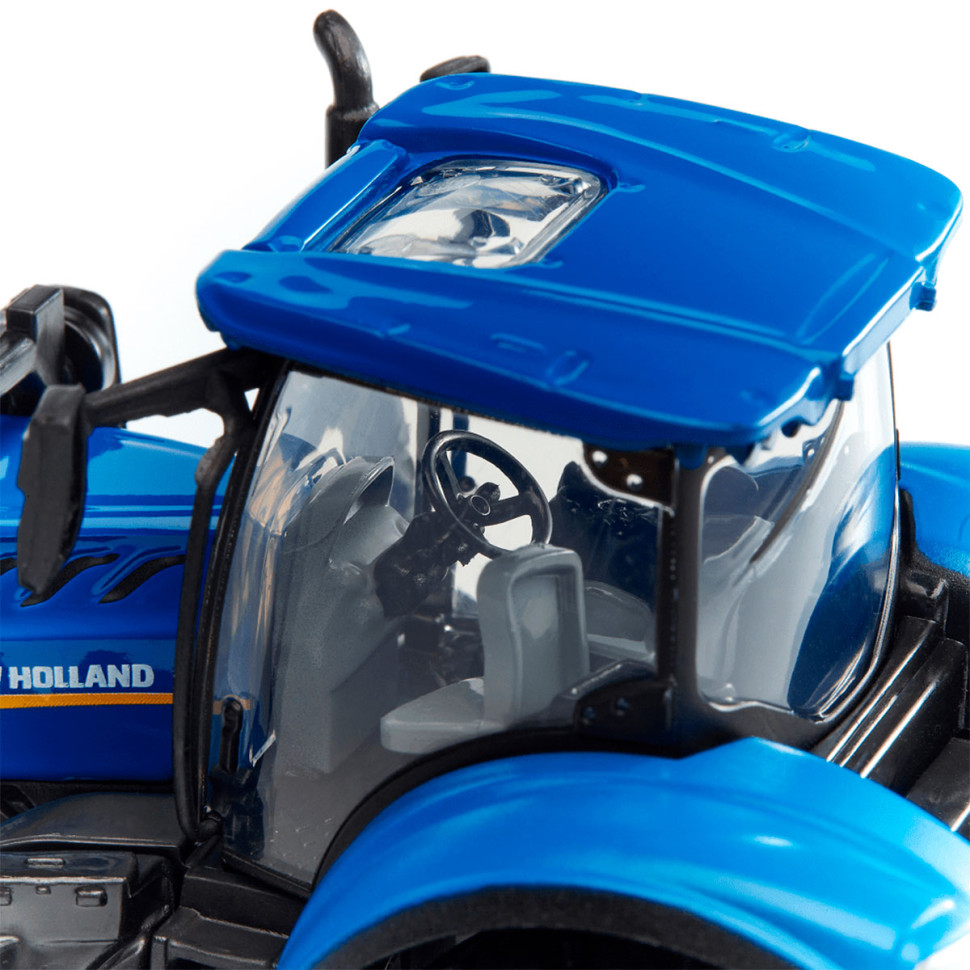 Детская игрушка Трактор NEW HOLLAND T7.315 Bburago 18-31632 с фронтальным погрузчиком