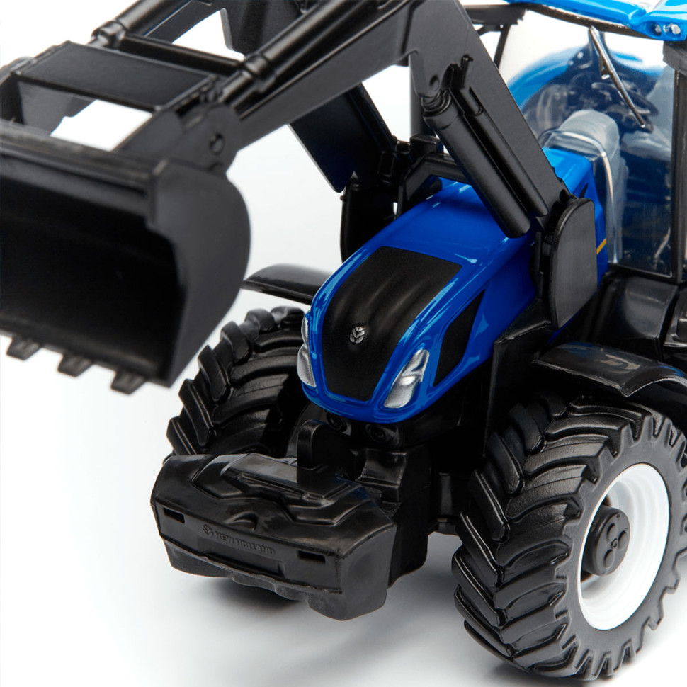 Детская игрушка Трактор NEW HOLLAND T7.315 Bburago 18-31632 с фронтальным погрузчиком